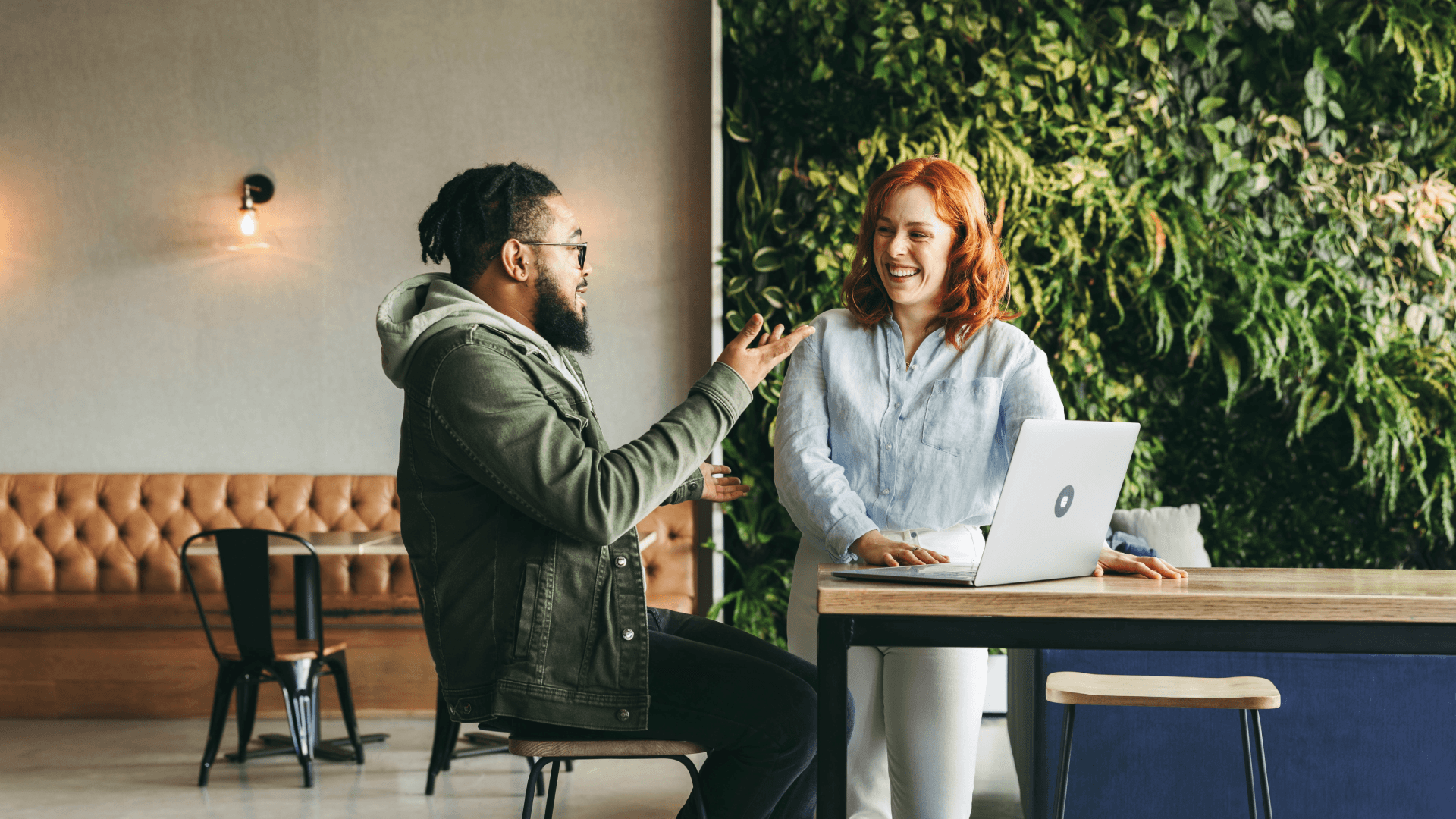 two people working on real estate marketing plan