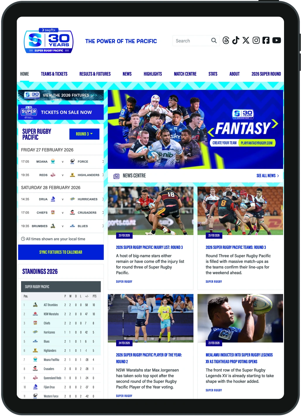 Front view of a gold-colored tablet device with a black screen and a front camera centered on the top bezel.