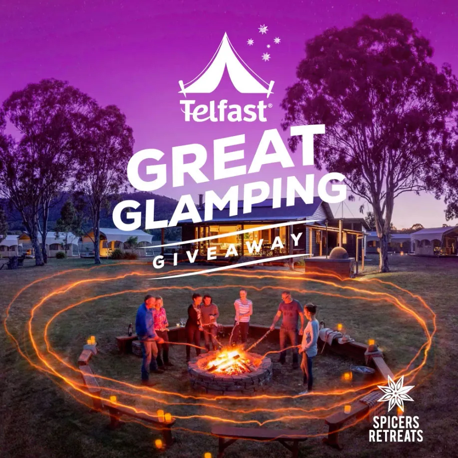 Group of people sitting around a campfire at dusk with tents and cabins in the background, overlaid with Telfast Great Glamping Giveaway and Spicers Retreats logos.