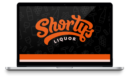 Laptop screen displaying the Shorty Liquor logo in orange and white on a dark background with beverage-related icons.