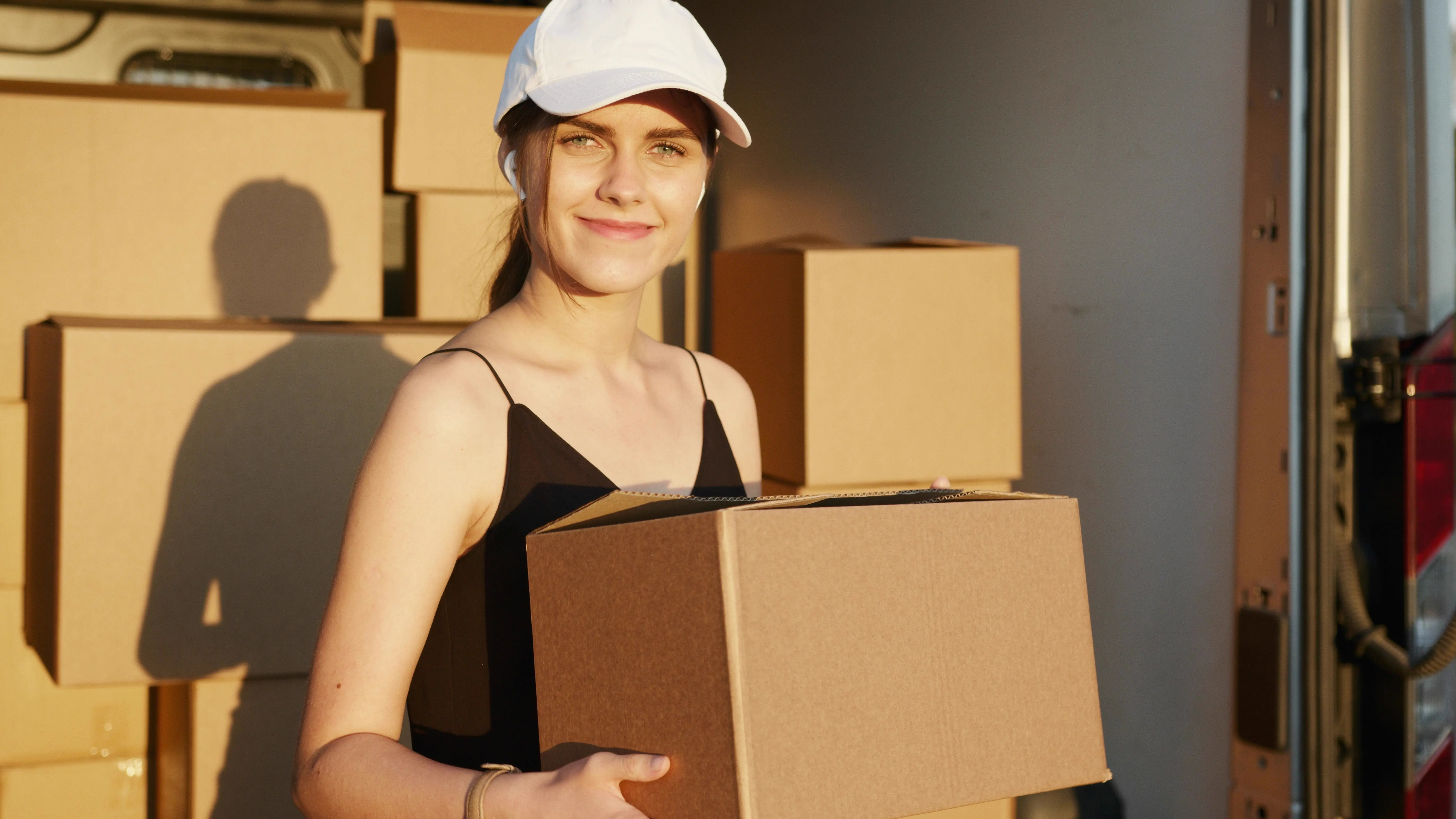 Relocate team member holding boxes