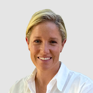 Lucy Pilcher, Founder/Managing Director of Lightly Medical, smiling and looking at camera