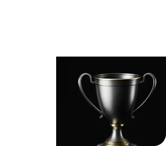 Silver trophy cup with two handles on a black background.