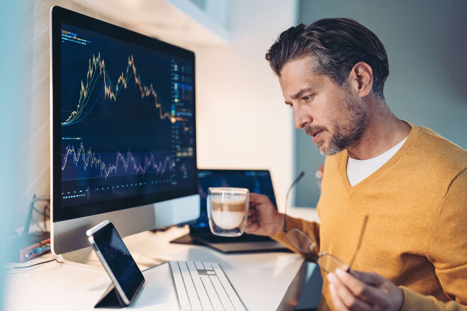 Person Using Laptop for Trading - Black Friday Prop Firm Deals