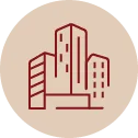 Icon of three stylized buildings representing urban or office structures.