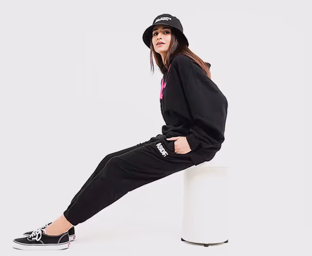 A collage of lifestyle images featuring diverse individuals wearing ASDF merchandise and using ASDF products.