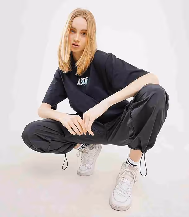 A collage of lifestyle images featuring diverse individuals wearing ASDF merchandise and using ASDF products.