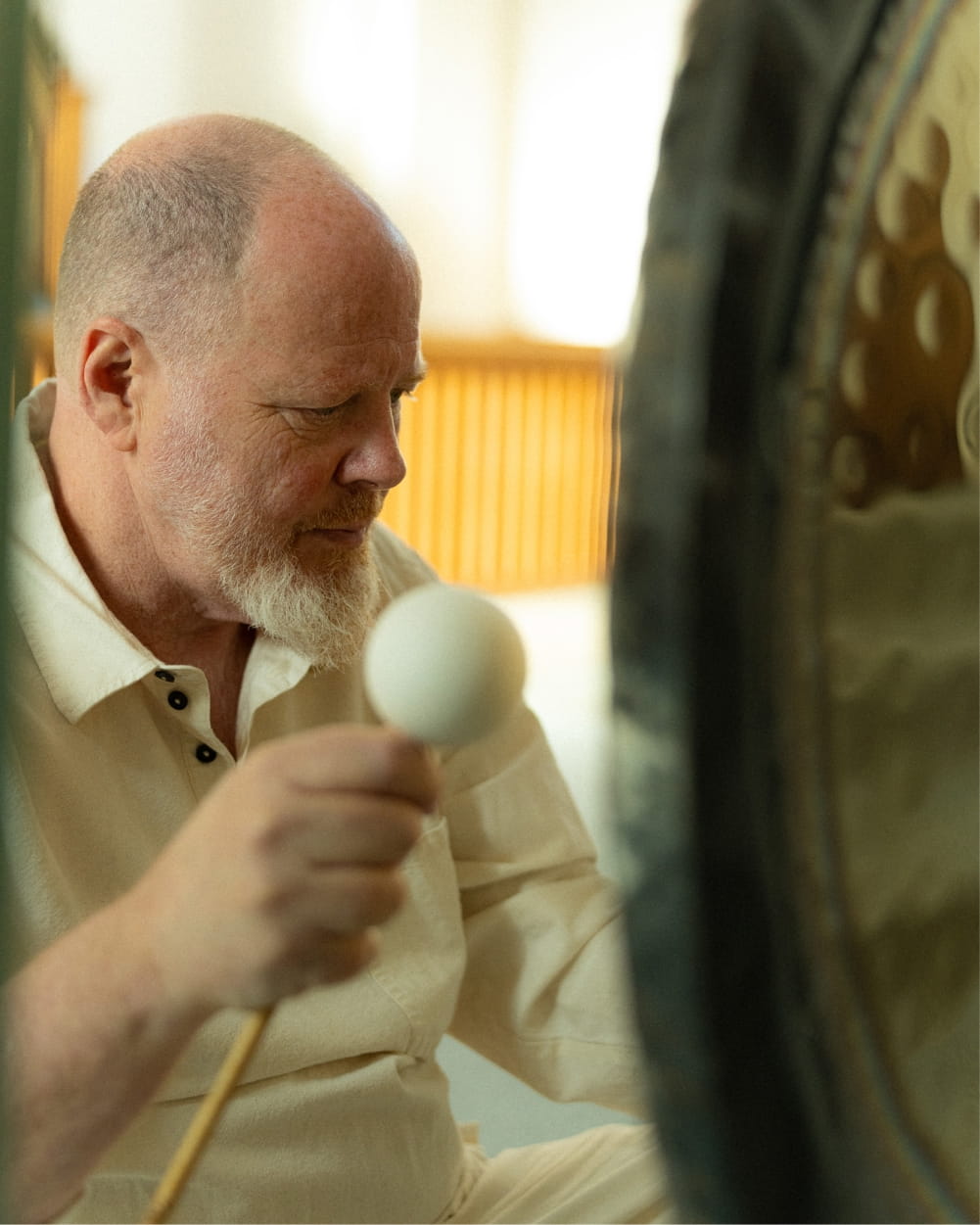 Alan playing the gongs