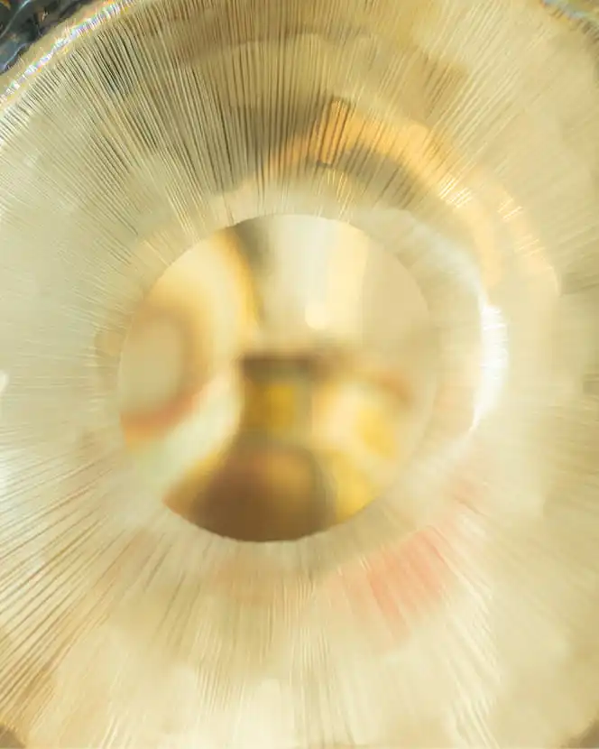 Close-up view through a circular translucent textured glass object.