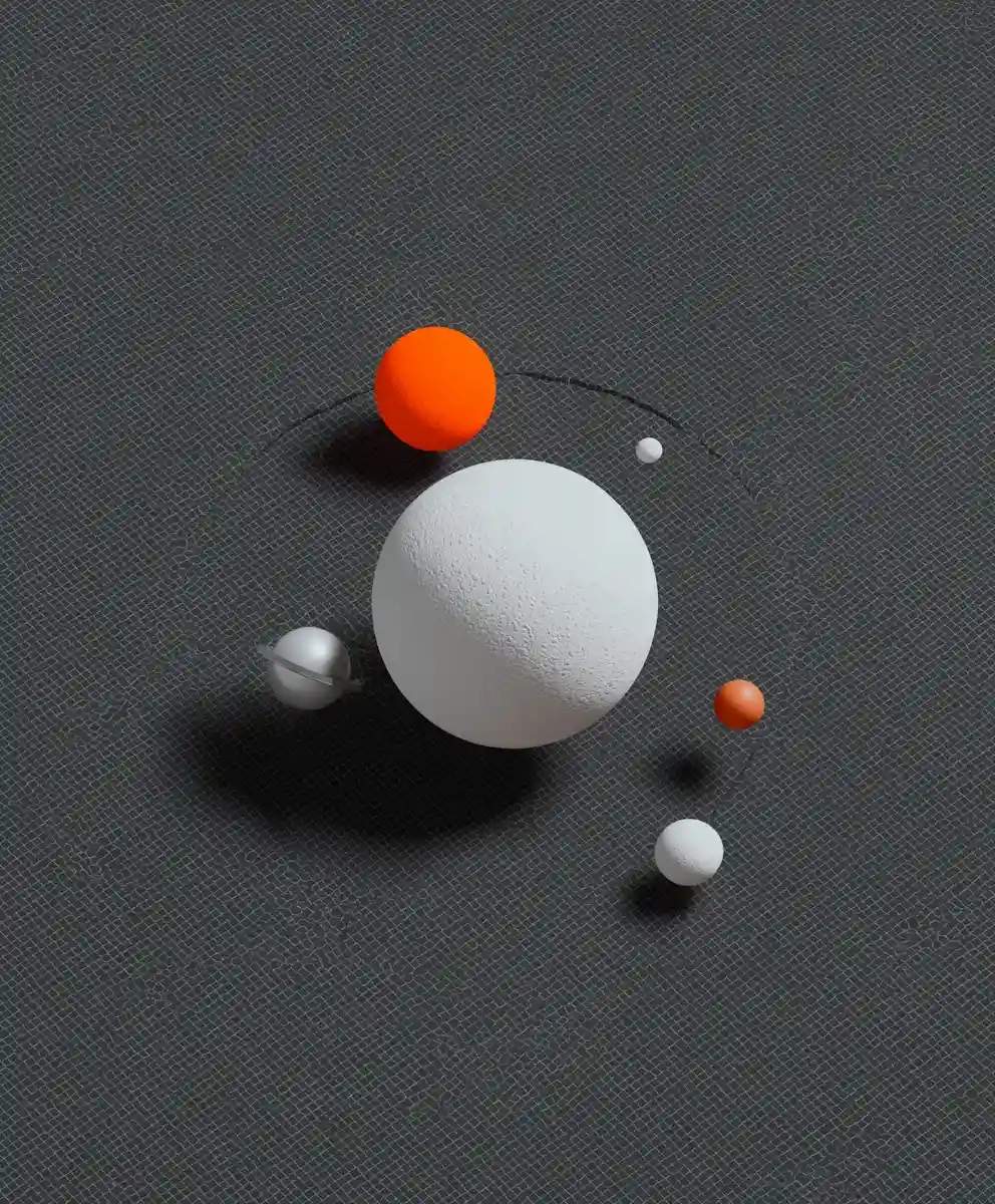 Glossy floating spheres in various colors including black, orange, yellow, navy blue, and white with orange dots on a light gray background.