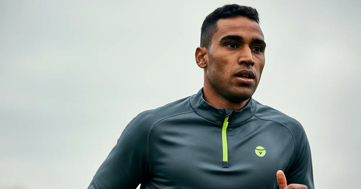 Athlete running outdoors in performance sportswear