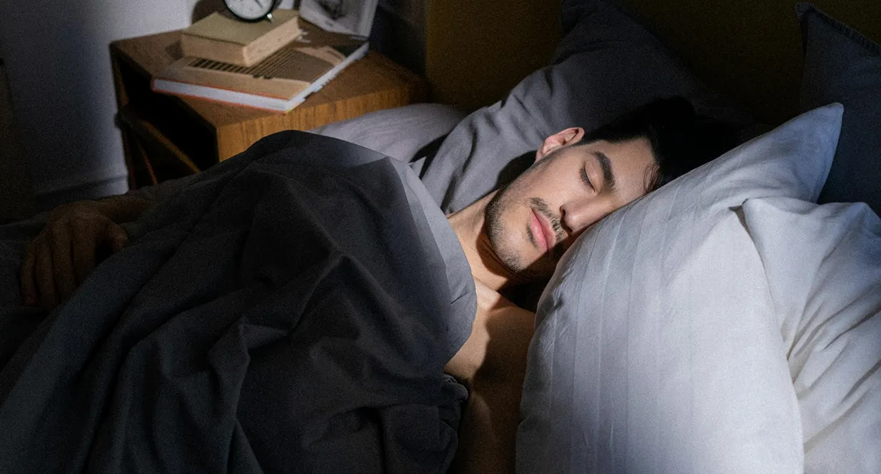 Woman enjoying sunlight with eyes closed
