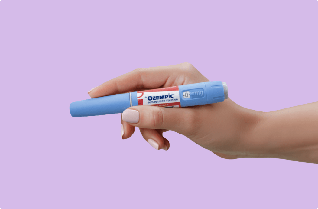 Smiling woman with short, curly pink hair wearing a pink jacket standing outdoors next to text reading 'Lose over 23% of your body weight in 1 year¹' on a dark green background.