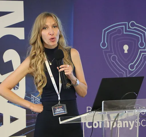 Woman speaking on security conference