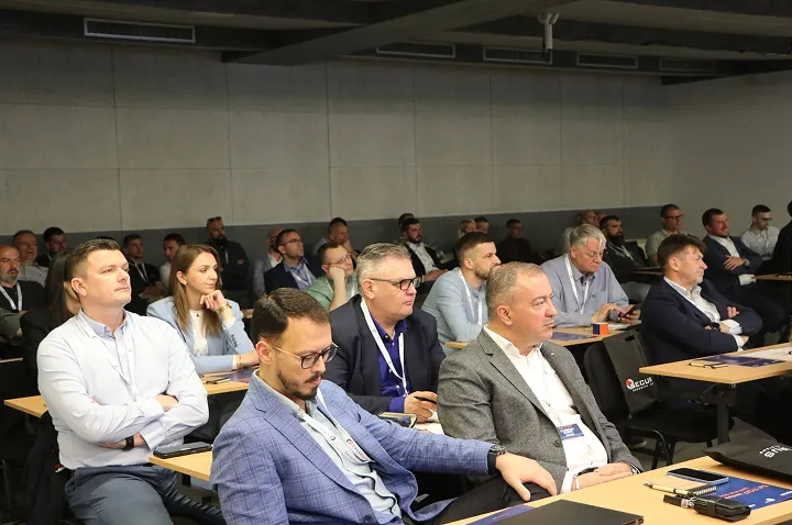 Audience attending professional conference session