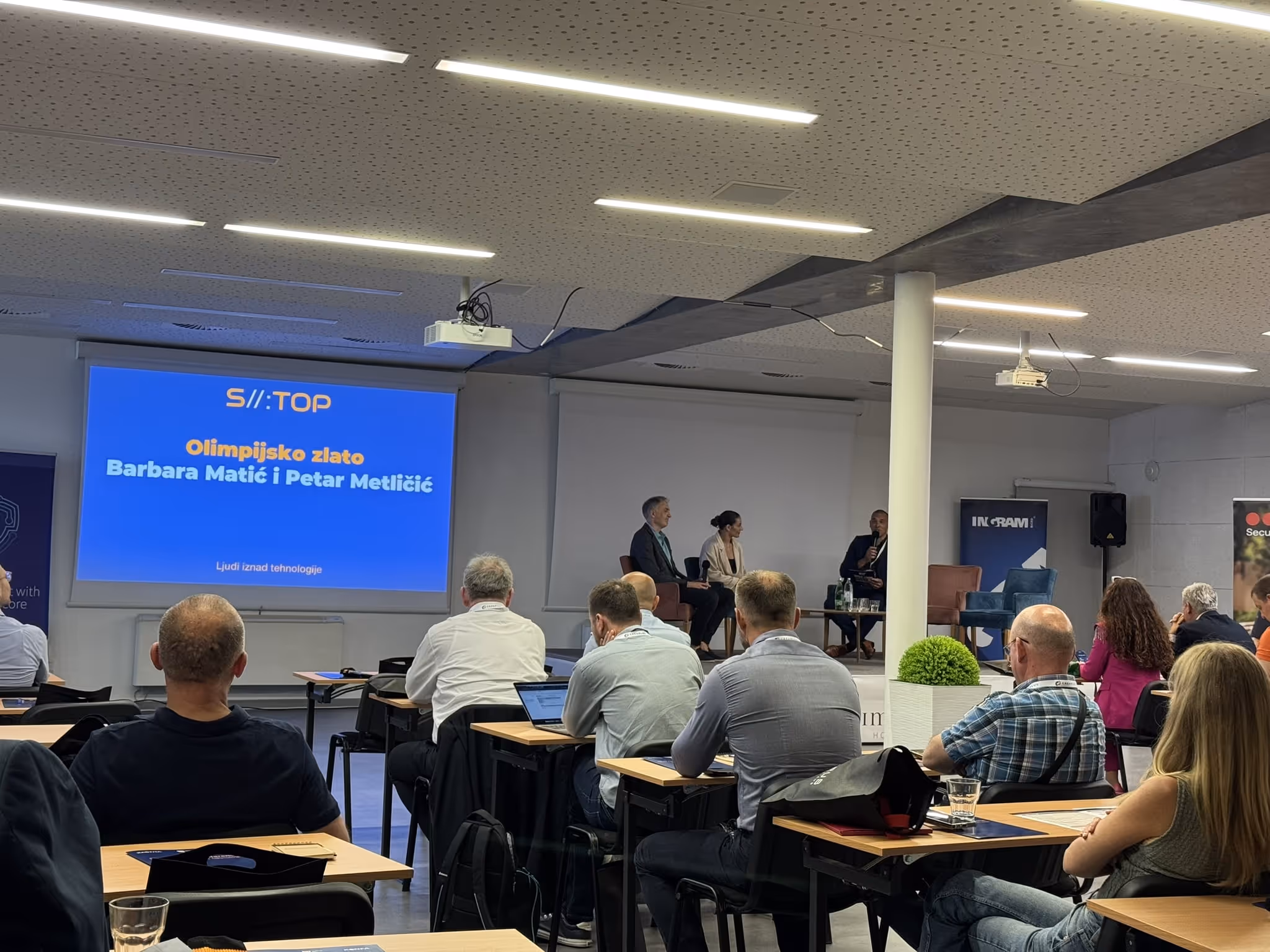 Group of people attending security conference 