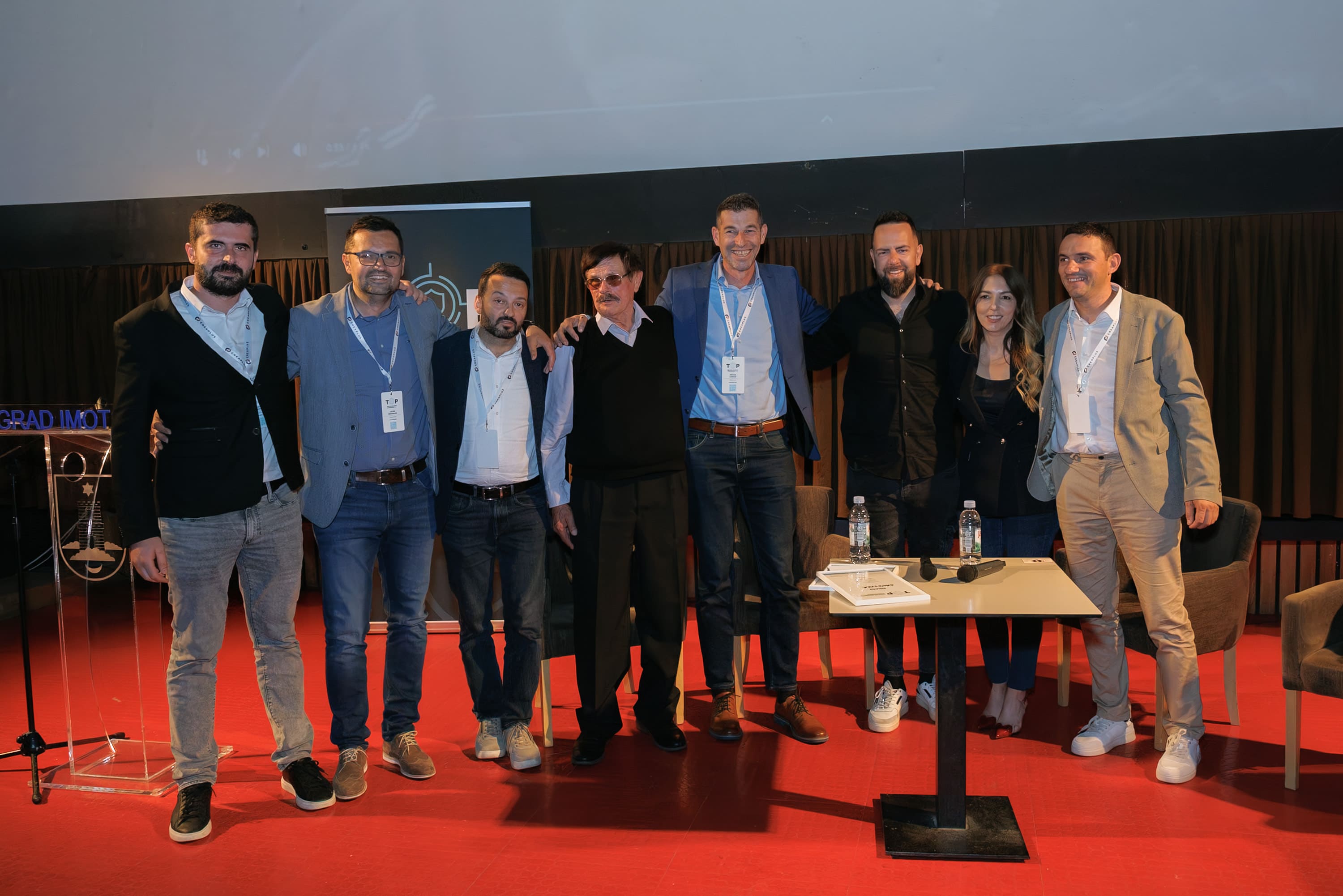 People on stage of Top Confrerence