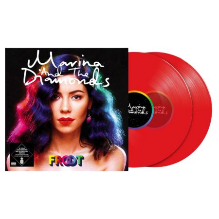 Das Albumcover von Marina And The Diamonds' 'Froot' mit Porträt einer Frau mit regenbogenfarbenem Haar und zwei roten Schallplatten im Hintergrund.
