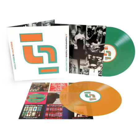 Albumcover von Ashnikko mit einem fantasievollen Cartoon-Gesicht mit blauen Haaren vor einem rosafarbenen Himmel und blauem Vinylschallplatten-Design.