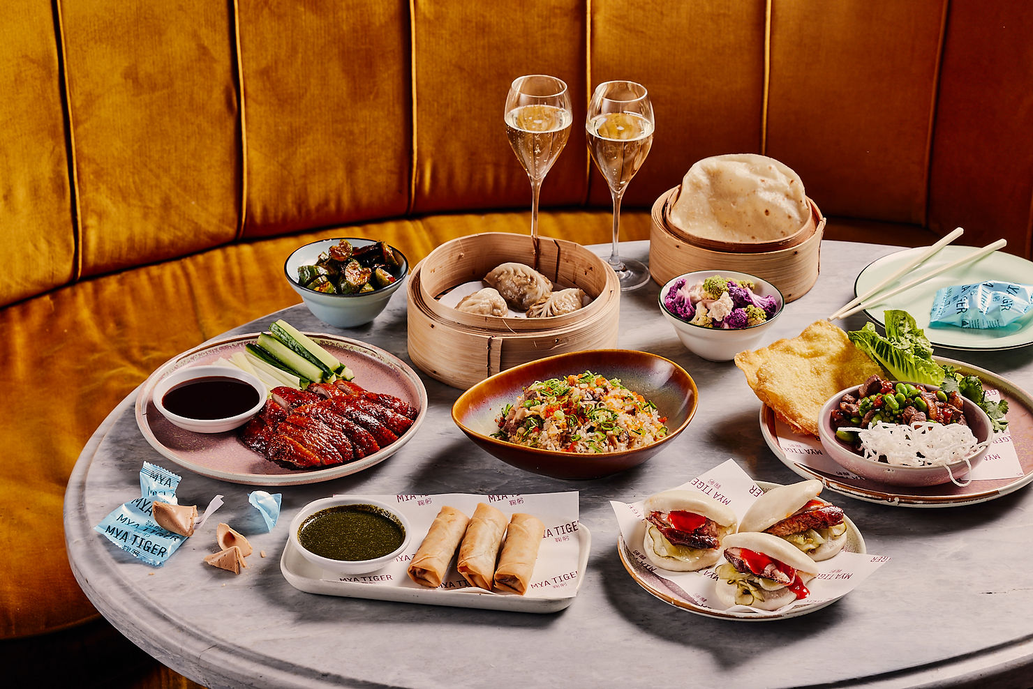 Asian cuisine spread on a marble top promoting a special offering at the Espy Hotel, St Kilda, captured by Tableside Creatives.