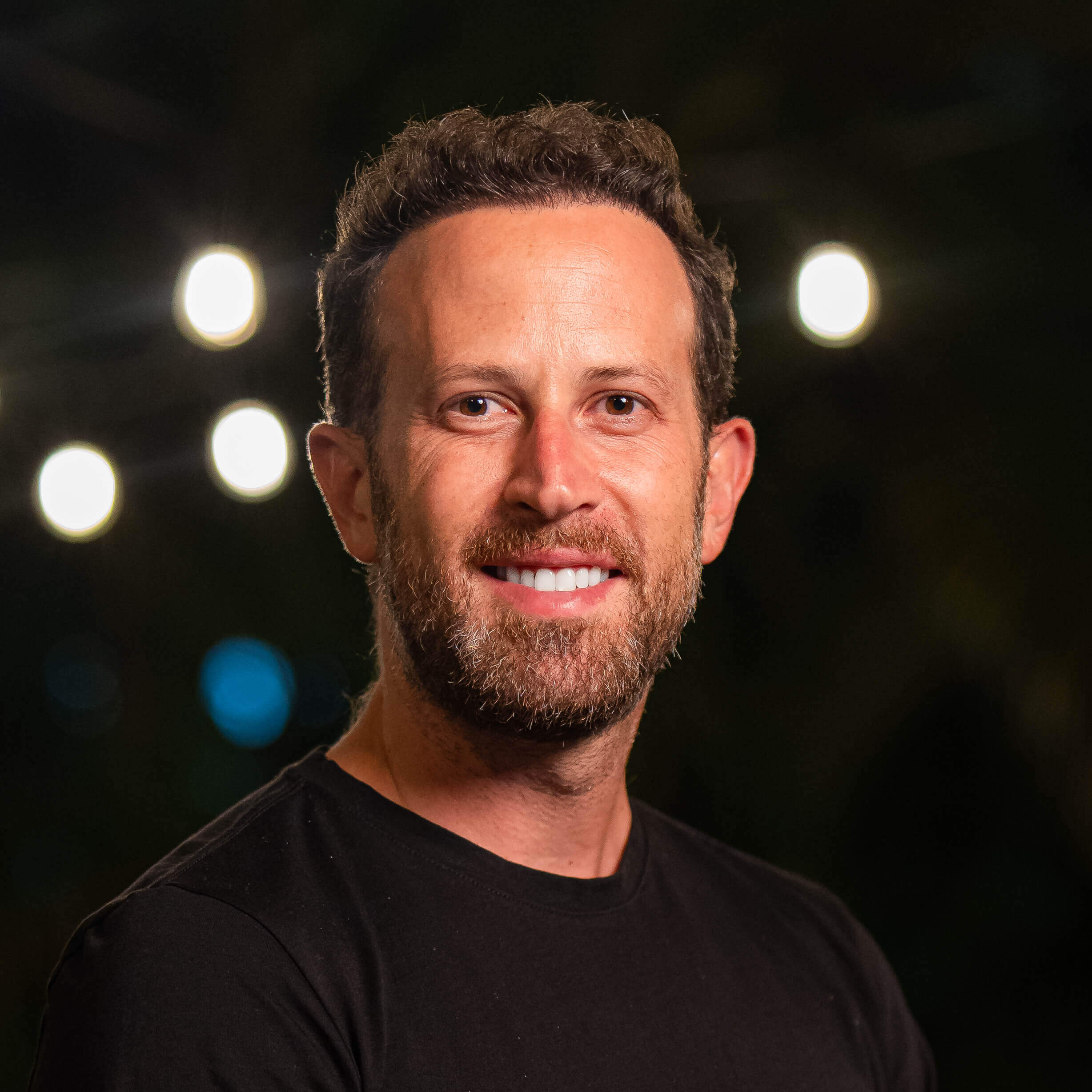 A portrait photo of Roga's CEO, Ami Lebendiker