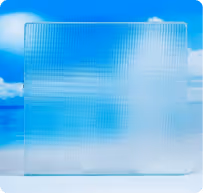 Transparent textured glass panel with a grid pattern against a blue sky background.