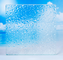 Square textured frosted glass panel with a clouded blue sky background.