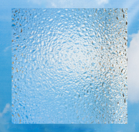 Square textured frosted glass panel with a clouded blue sky background.