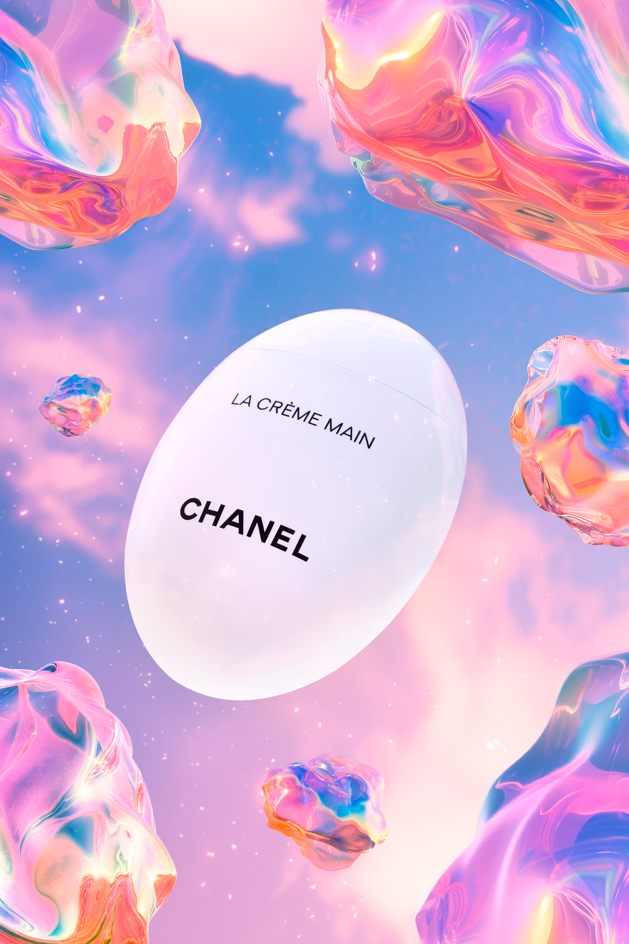 White egg-shaped container labeled 'LA CRÈME MAIN CHANEL' floating among colorful, translucent abstract shapes on a pink and blue background.