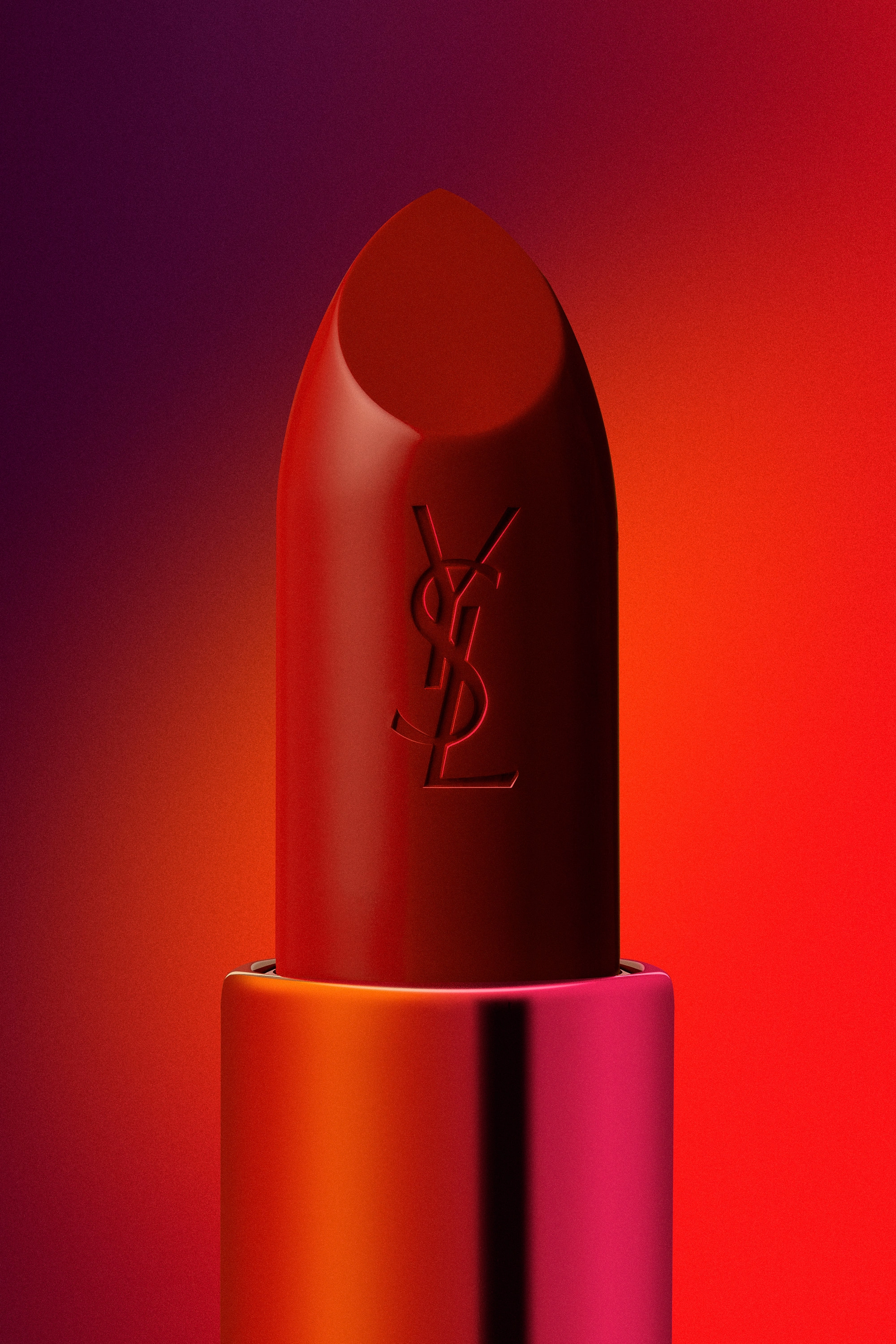 Close-up of a red YSL lipstick with a gradient red and purple background.