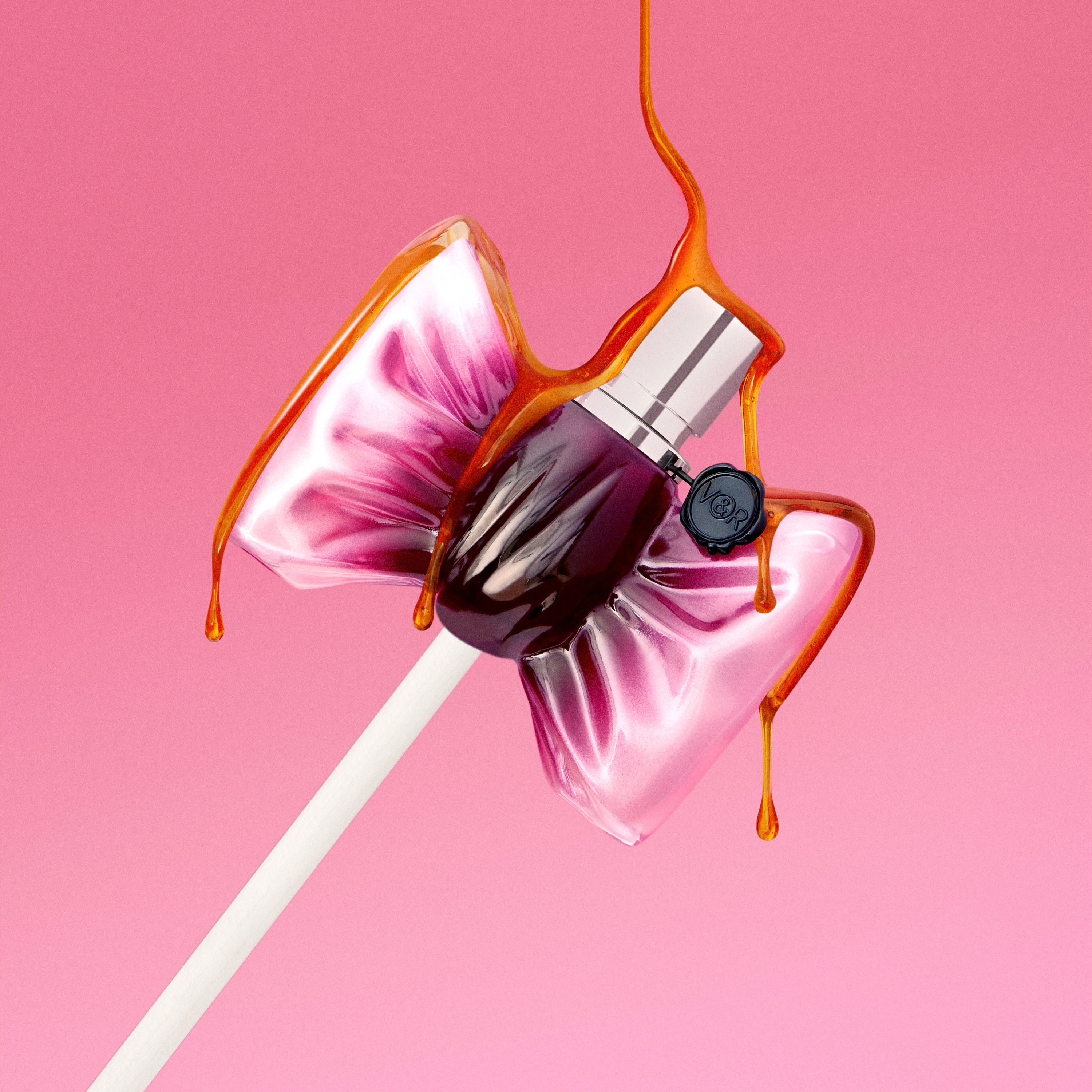 Lollipop shaped like a pink and purple perfume bottle with orange liquid dripping over it against a pink background.
