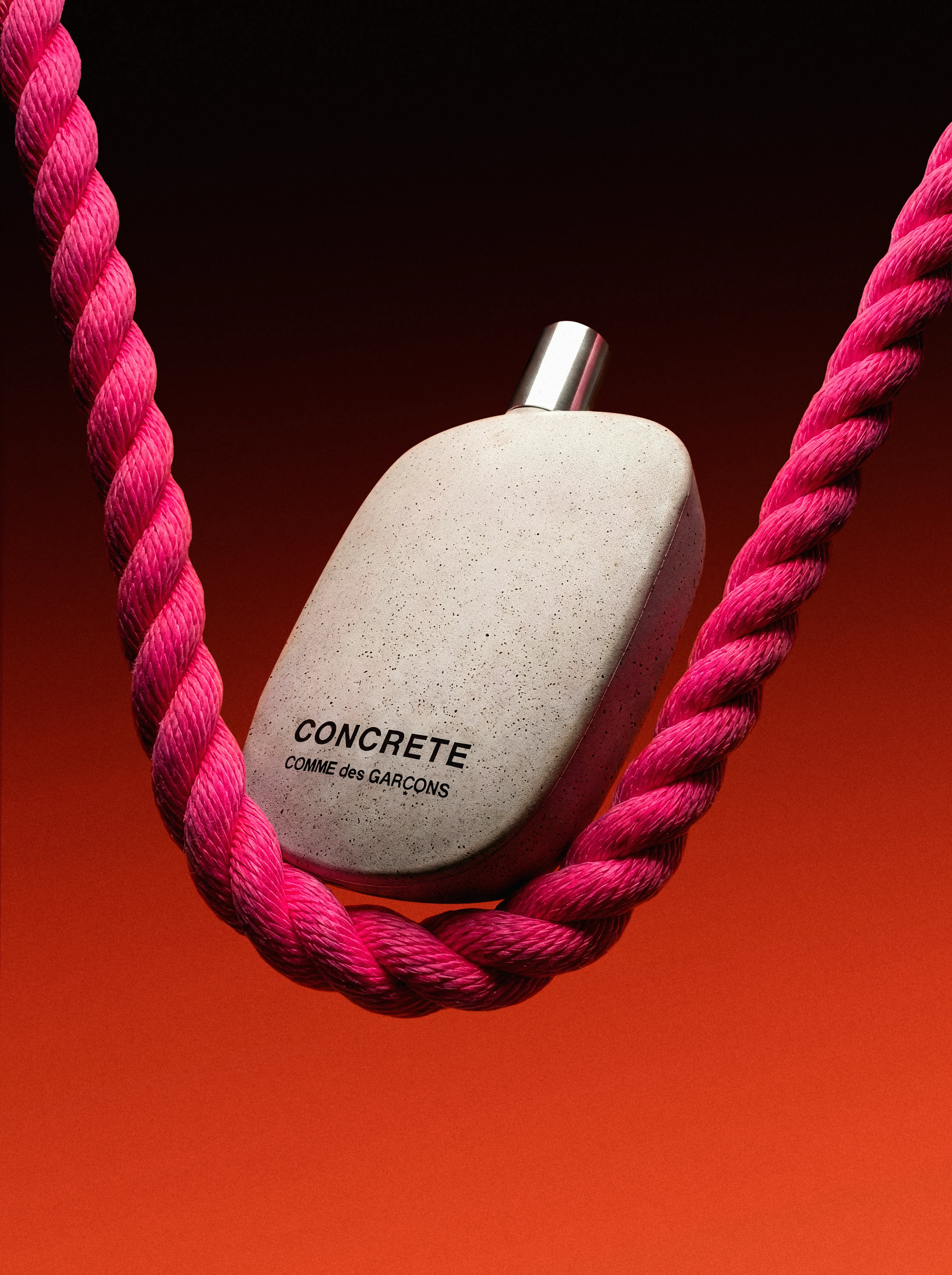 Abstract arrangement of red geometric shapes with gold decorative details and 'must de Cartier Paris' text on a blue background.