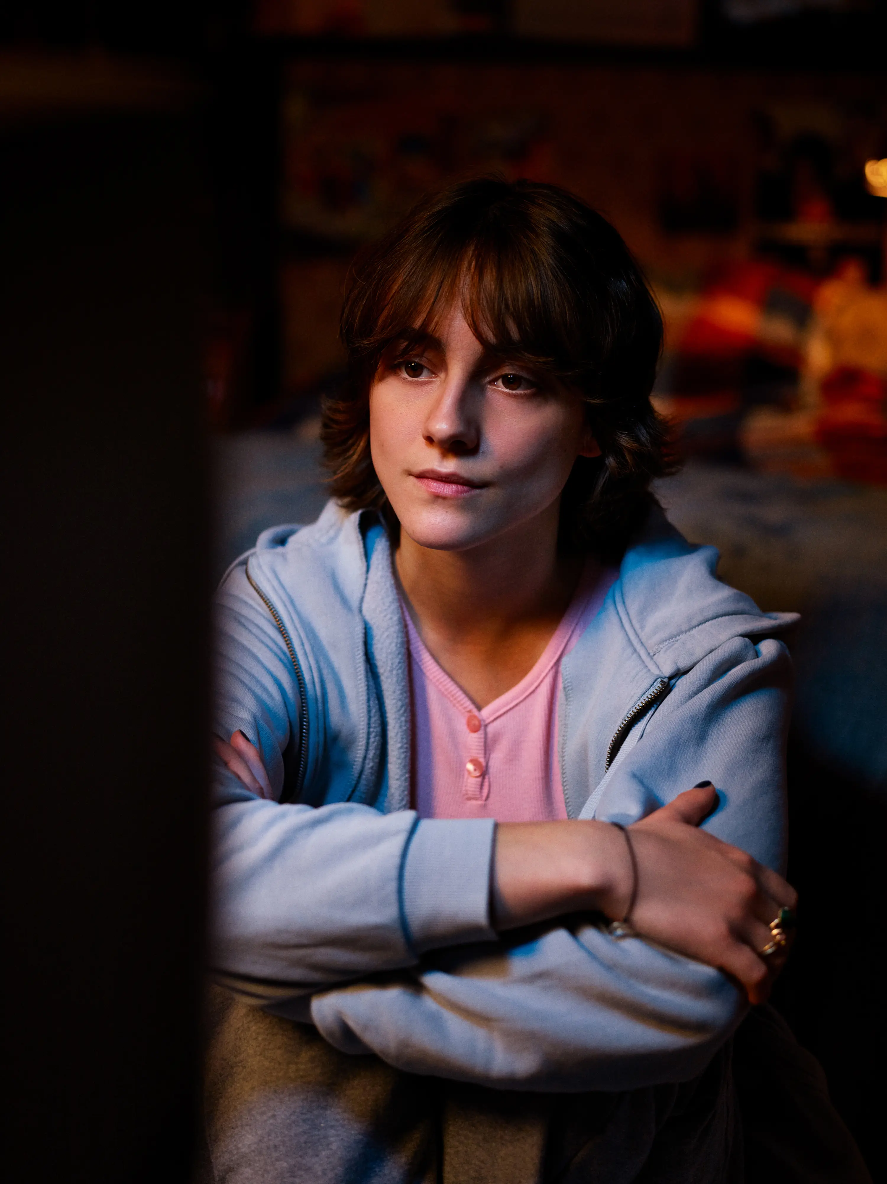 Transparent green plastic bag floating against a gradient green background.