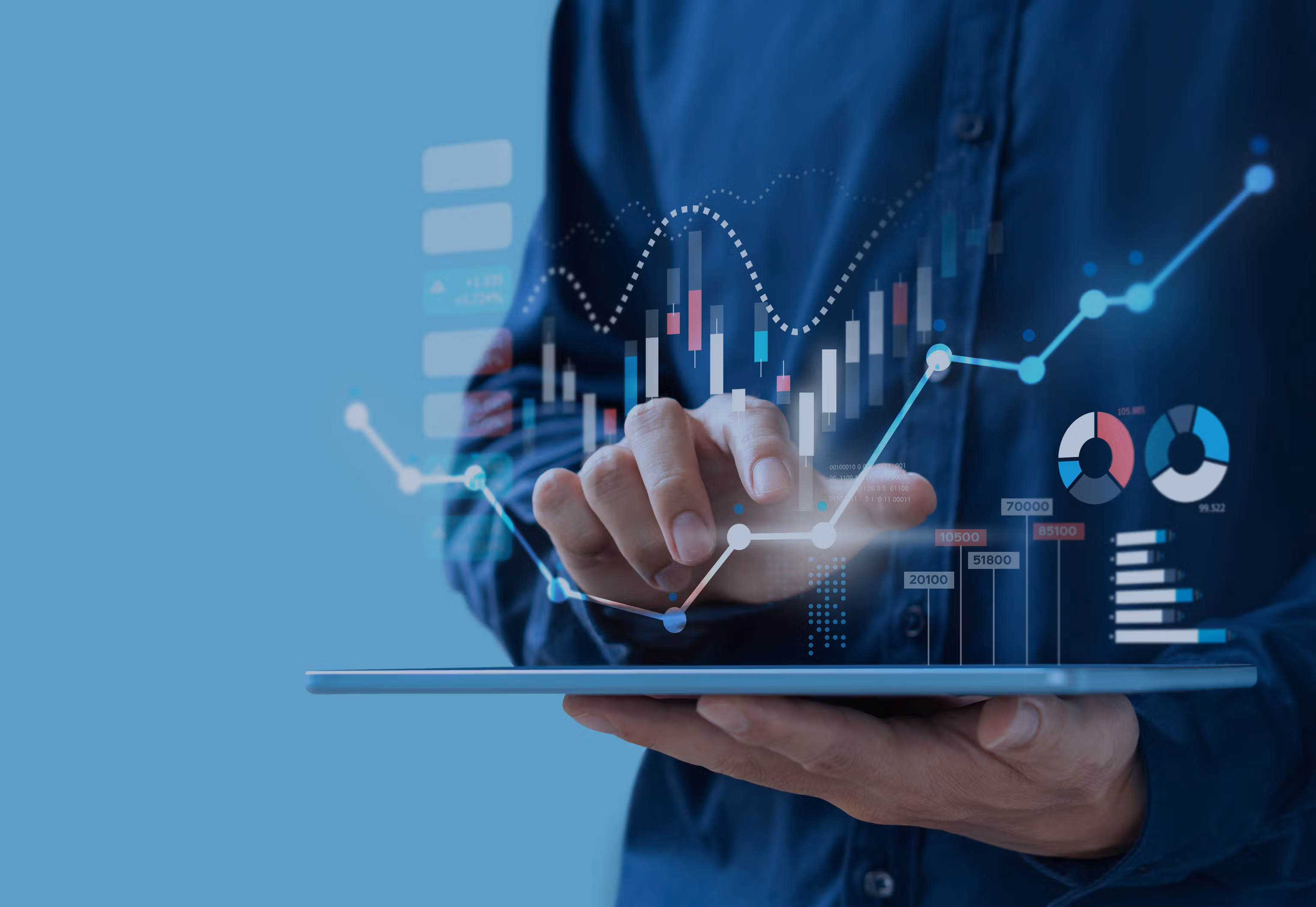 Business person analyzing financial data with interactive digital graphs