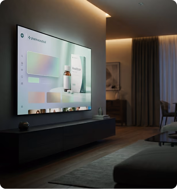 Modern living room with a wall-mounted TV displaying a pharmaceutical product advertisement.