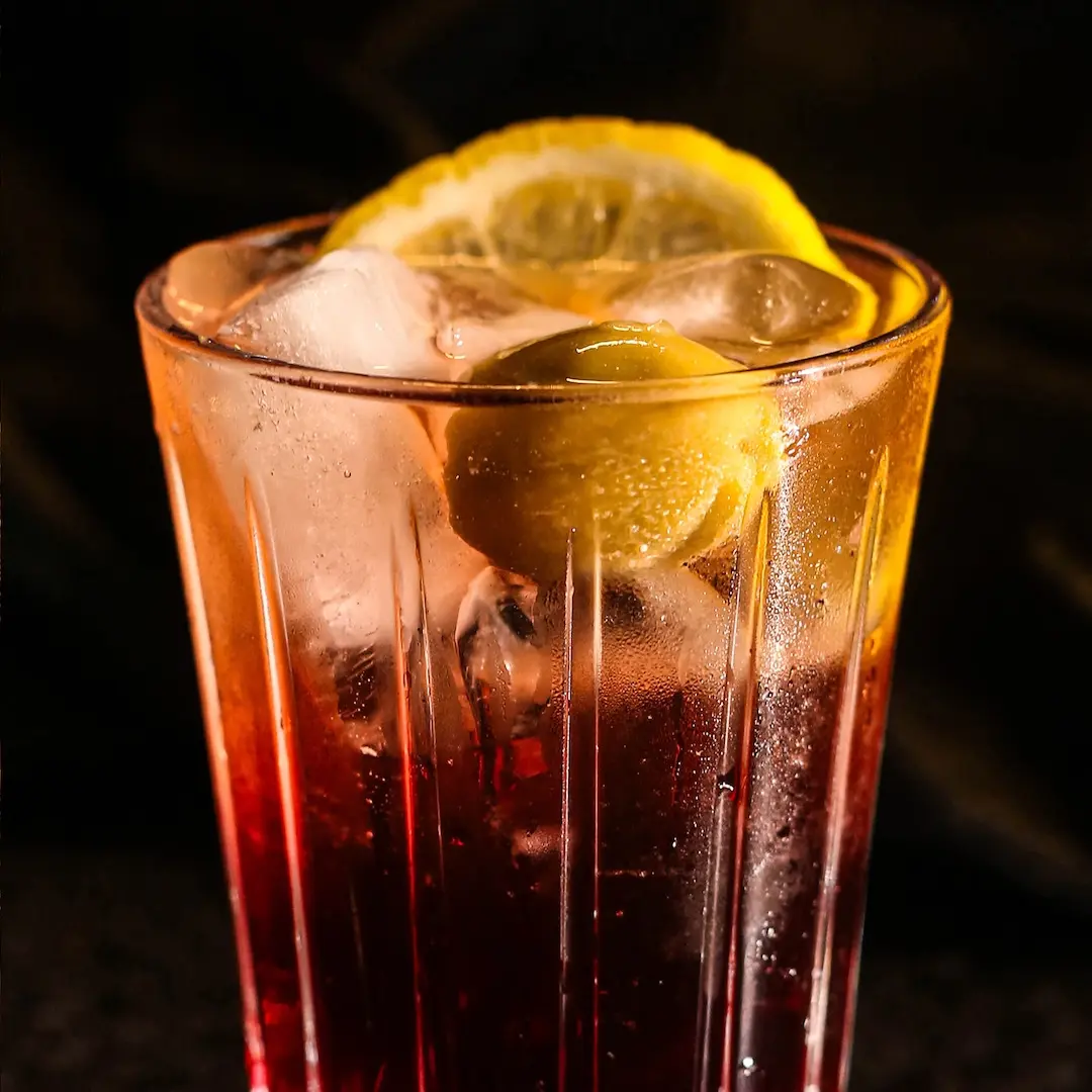 Non-alcoholic Americano cocktail on a dark background