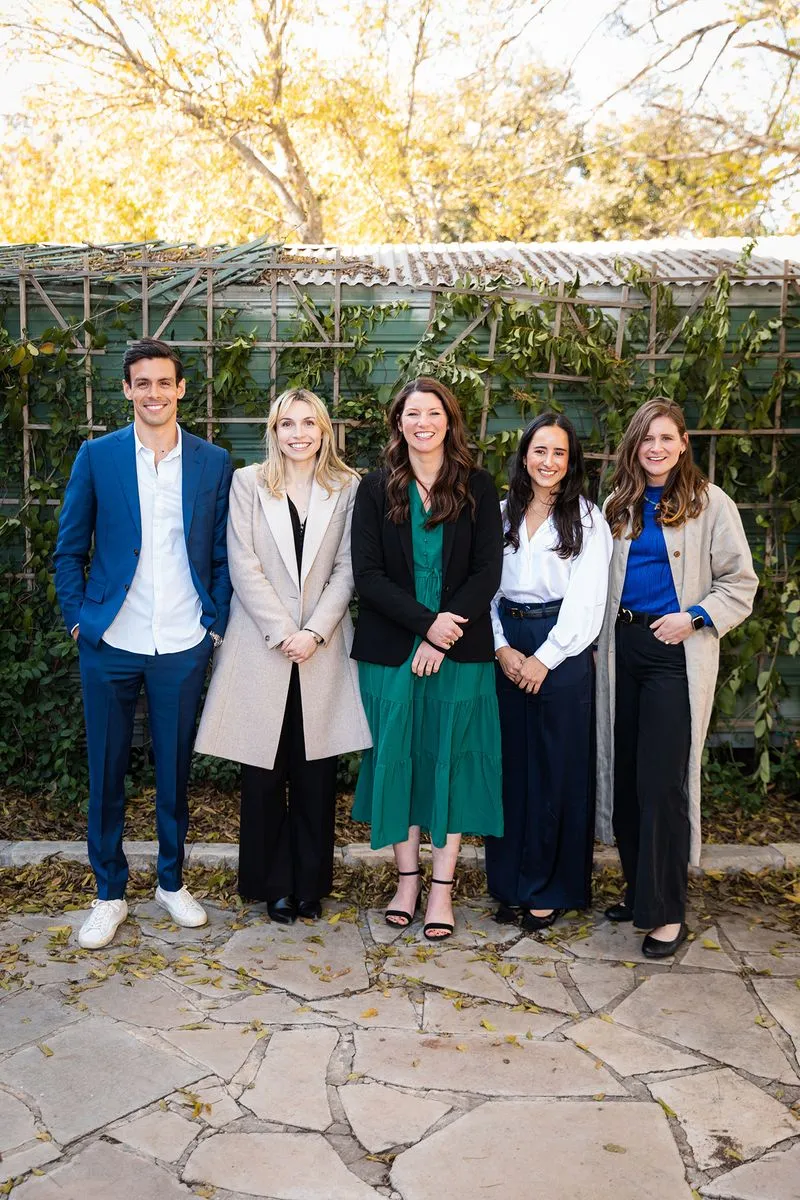 A group of people standing next to each other.