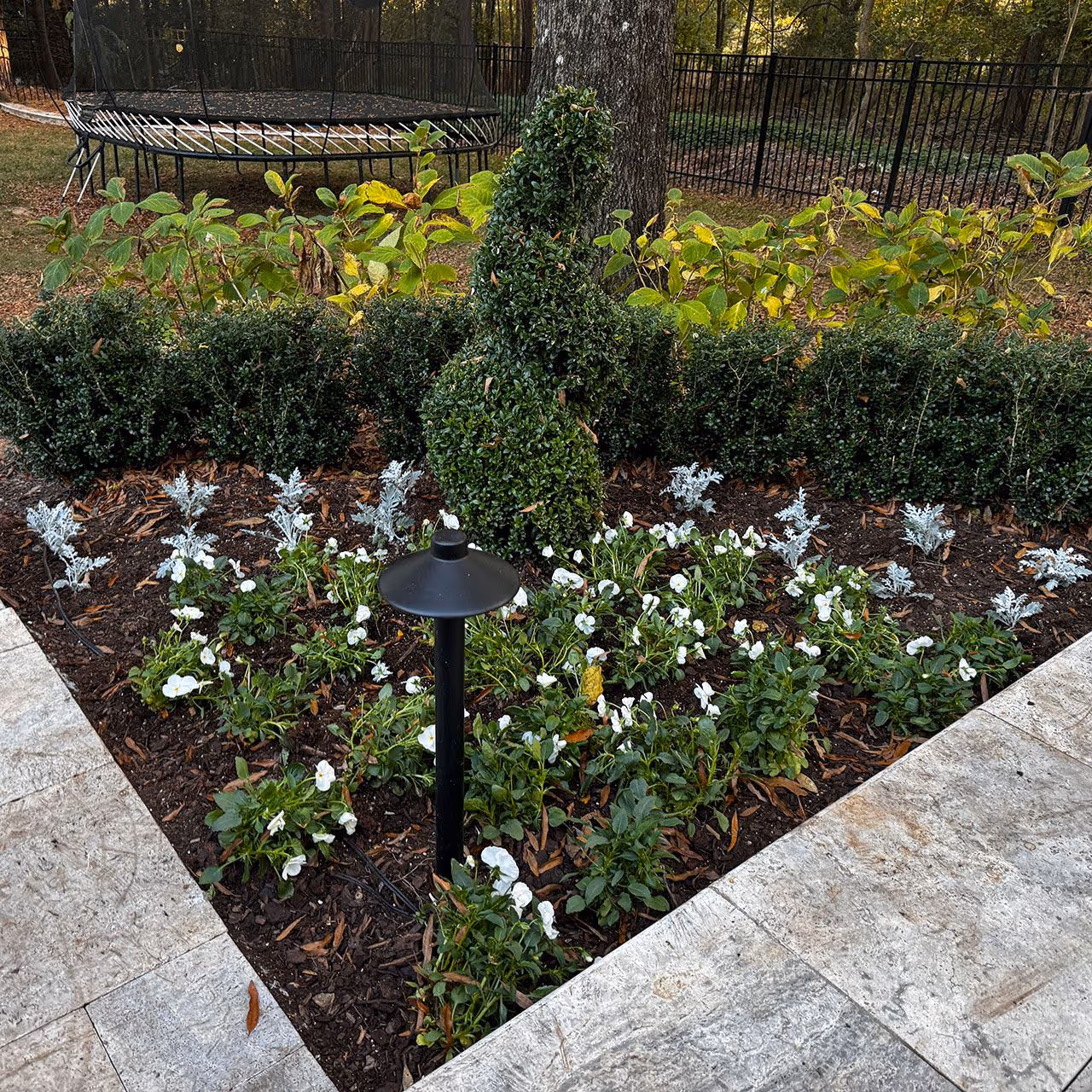 Seasonal flower planting by Cornerstone Landscaping