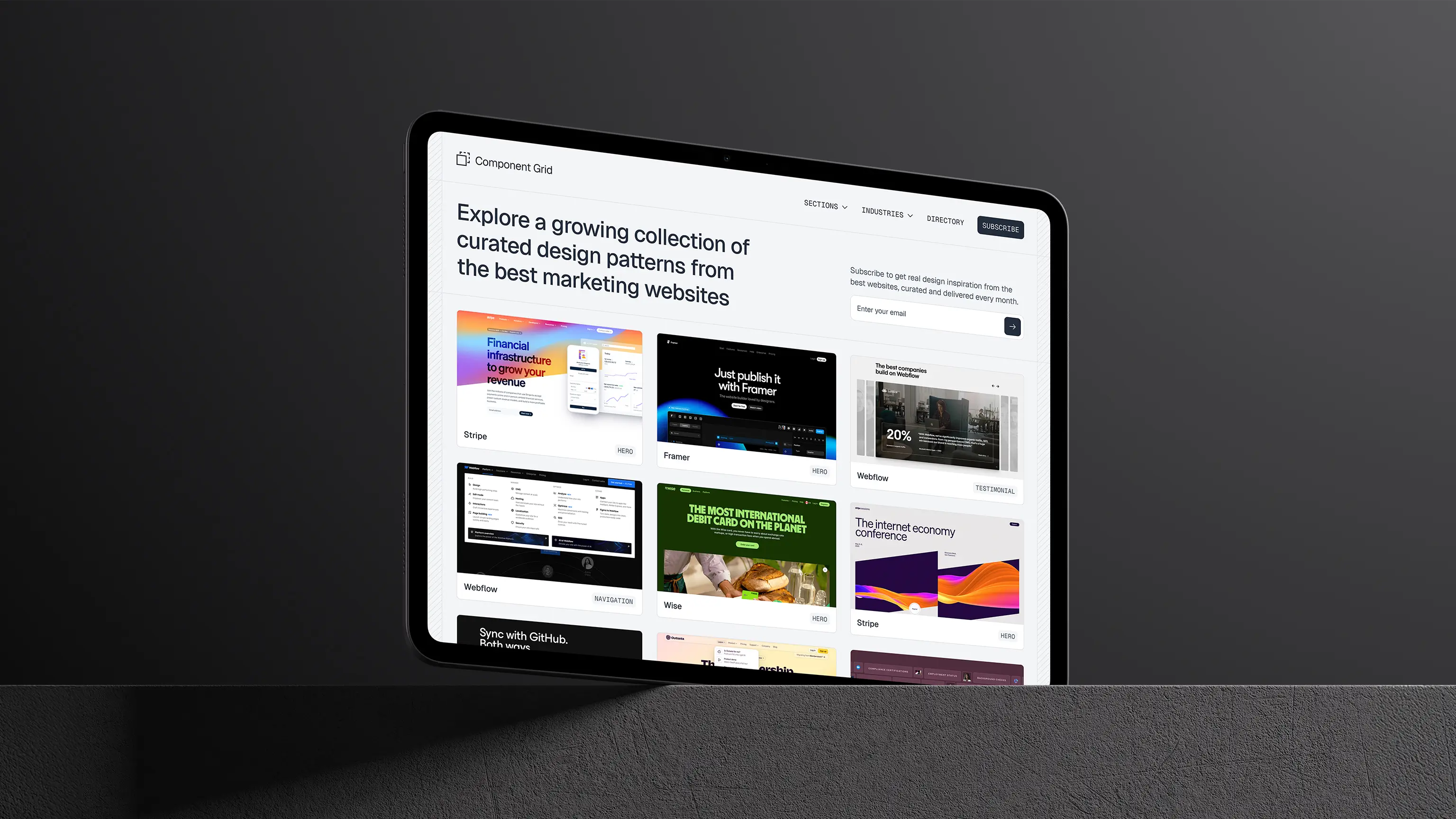Tablet displaying a website titled Component Grid featuring curated design pattern examples from marketing websites.