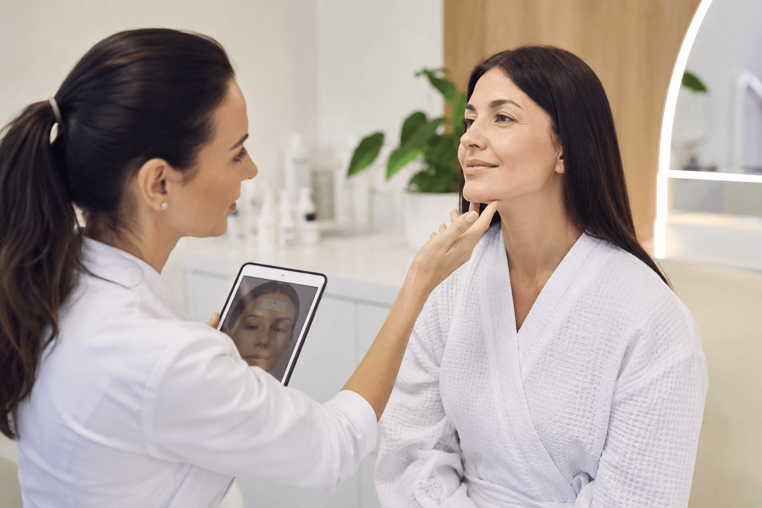 Woman receiving a non-surgical skin rejuvenation consultation at a medical spa in Forked River, New Jersey, to address wrinkles, fine lines, and uneven skin texture.