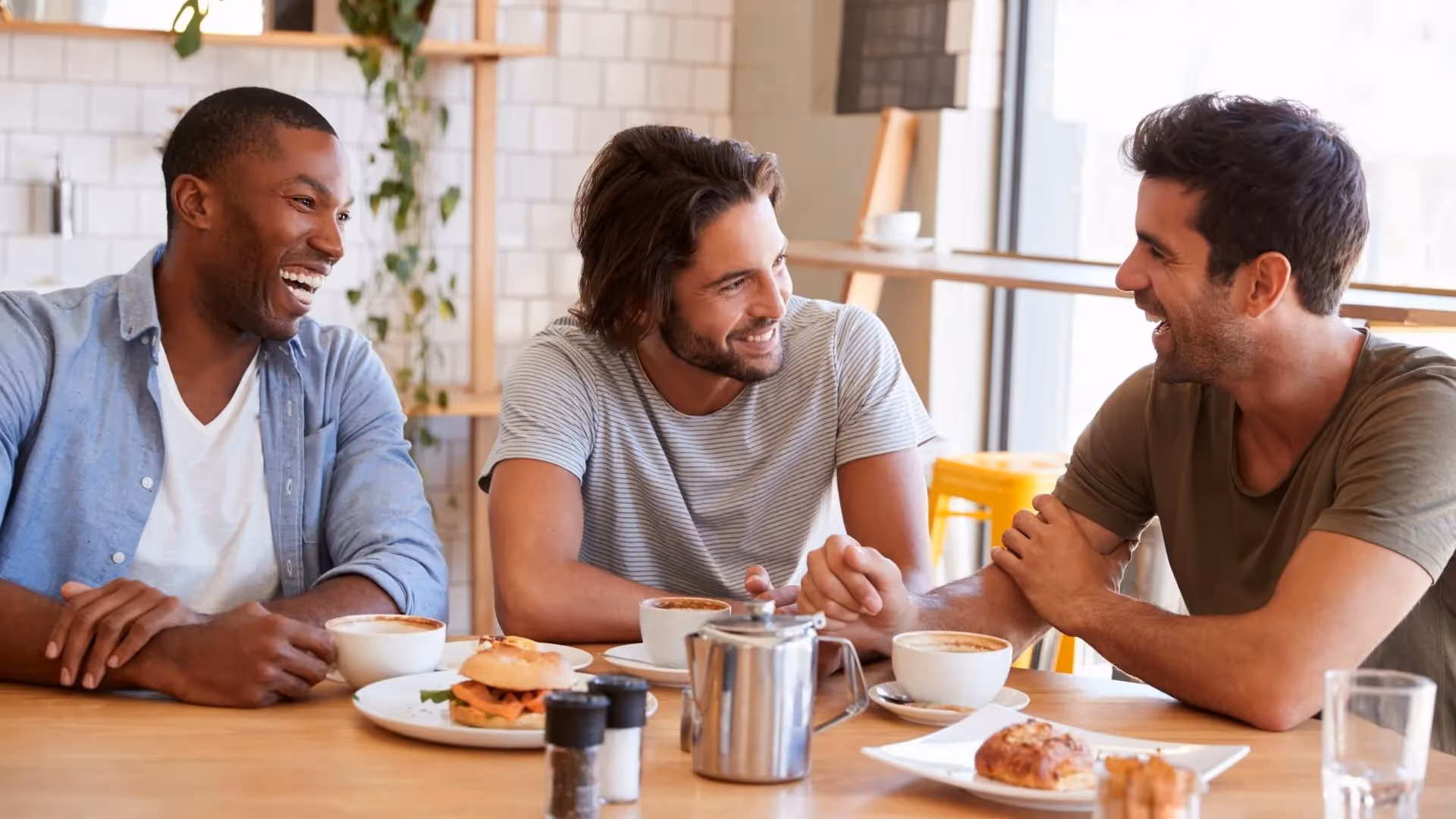 Men chatting with Coffee and food stock image