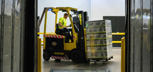 Warehouse forklift truck for delivery operations.