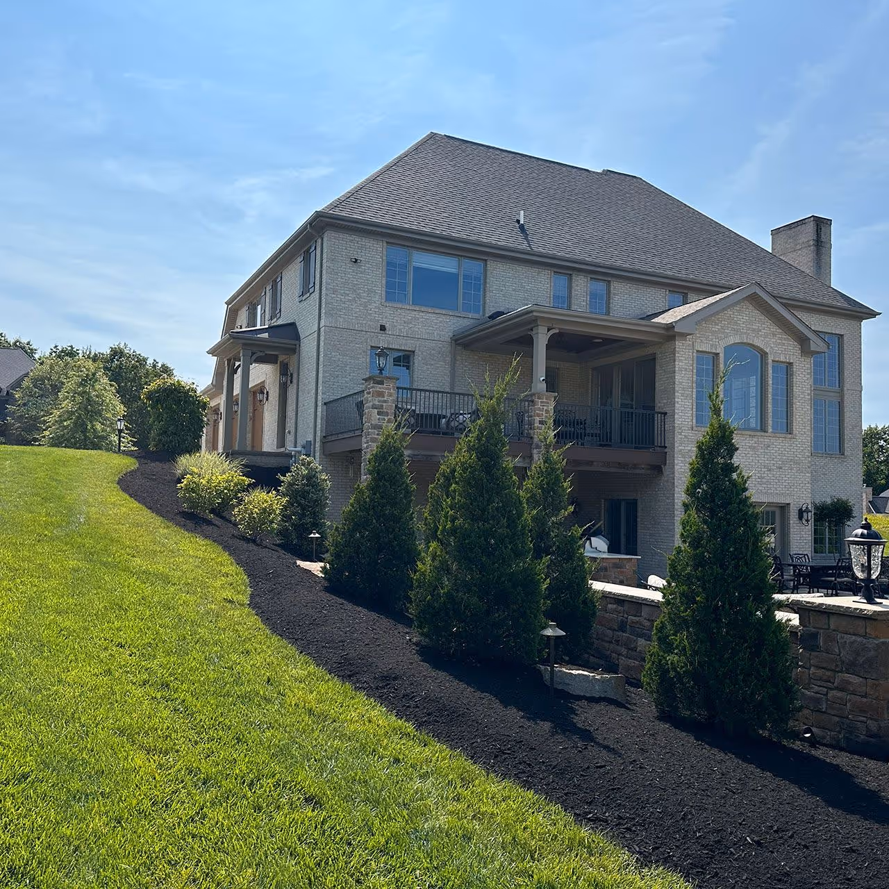 Residential lawn mowing and edging for a high-end home in Mars, PA