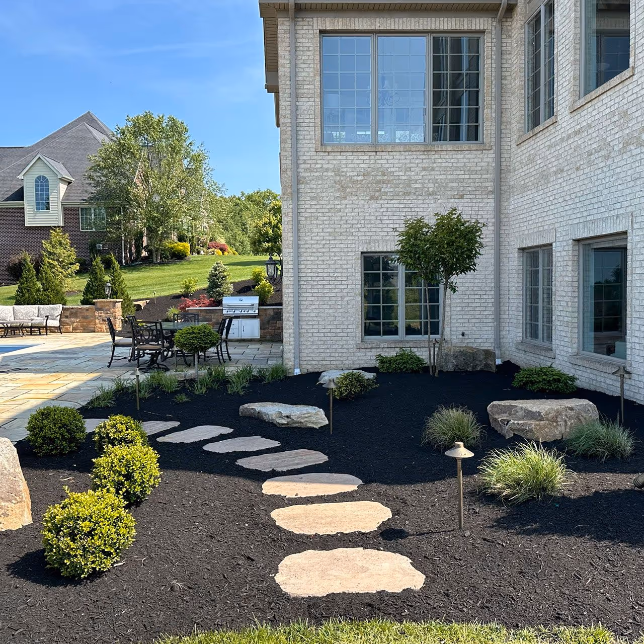 Mulching services enhancing curb appeal in Mars, PA