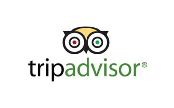 Tripadvisor logo featuring an owl face with one red and one green eye above the text 'tripadvisor' in black and green.