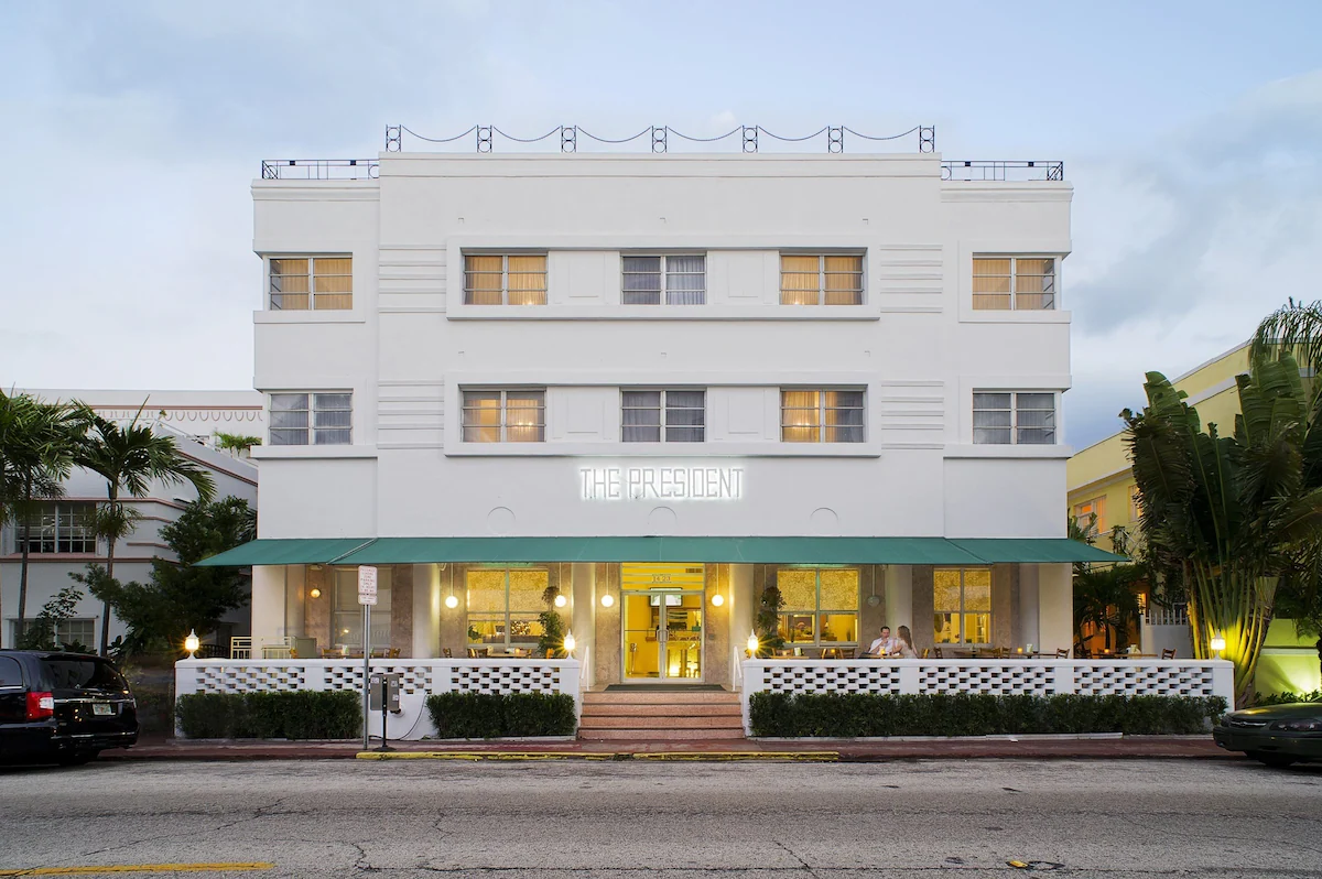 Exterior photo of President Hotel Miami Beach on a sunny day.
