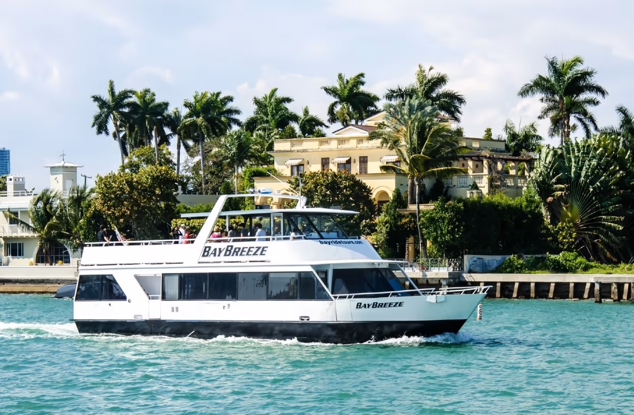 Boat tour from Bayside past the celebrity homes on a sunny day.