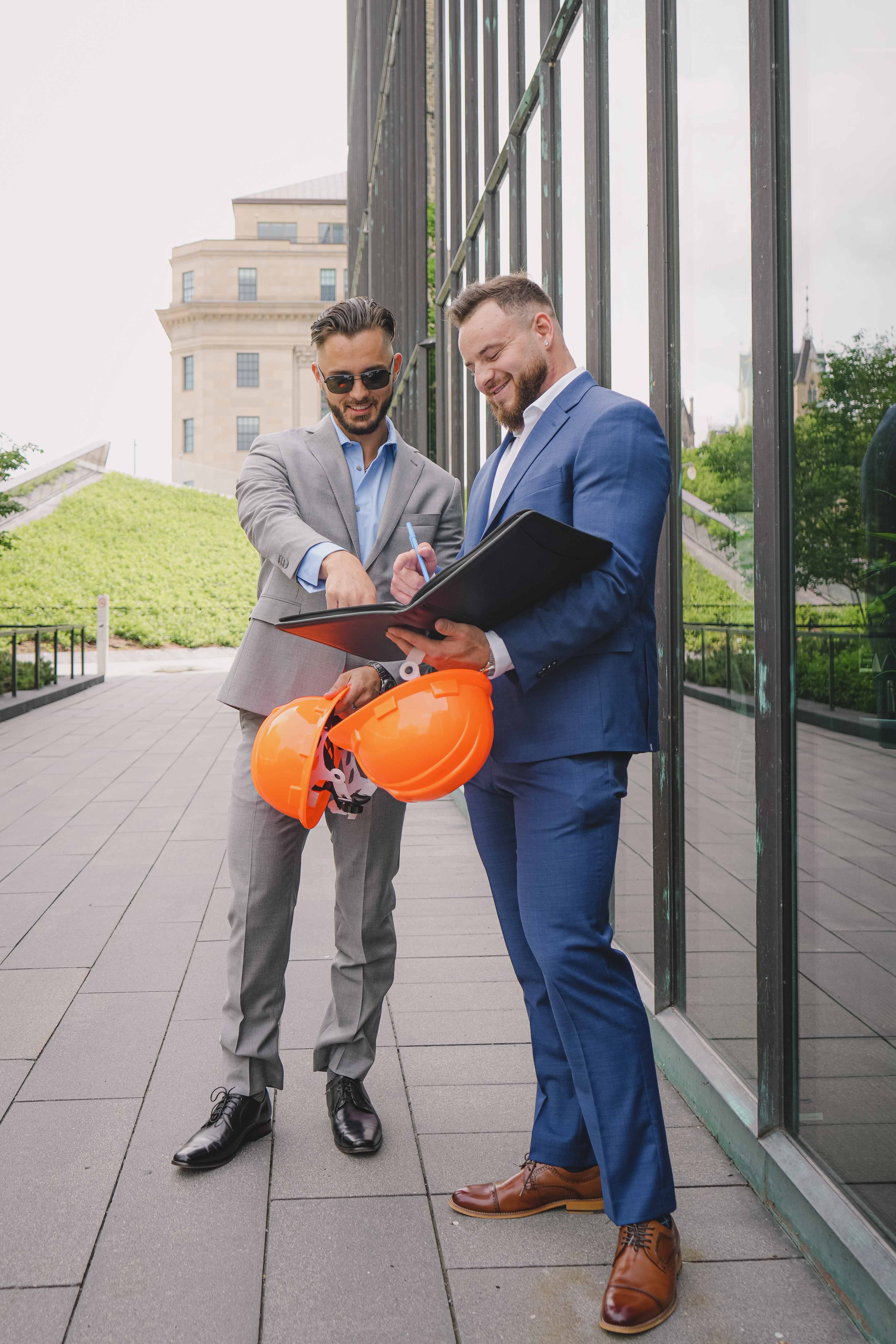 TRALO co-founder Travis Moriarty and Louis Lacombe-Denis looking over a service assessment