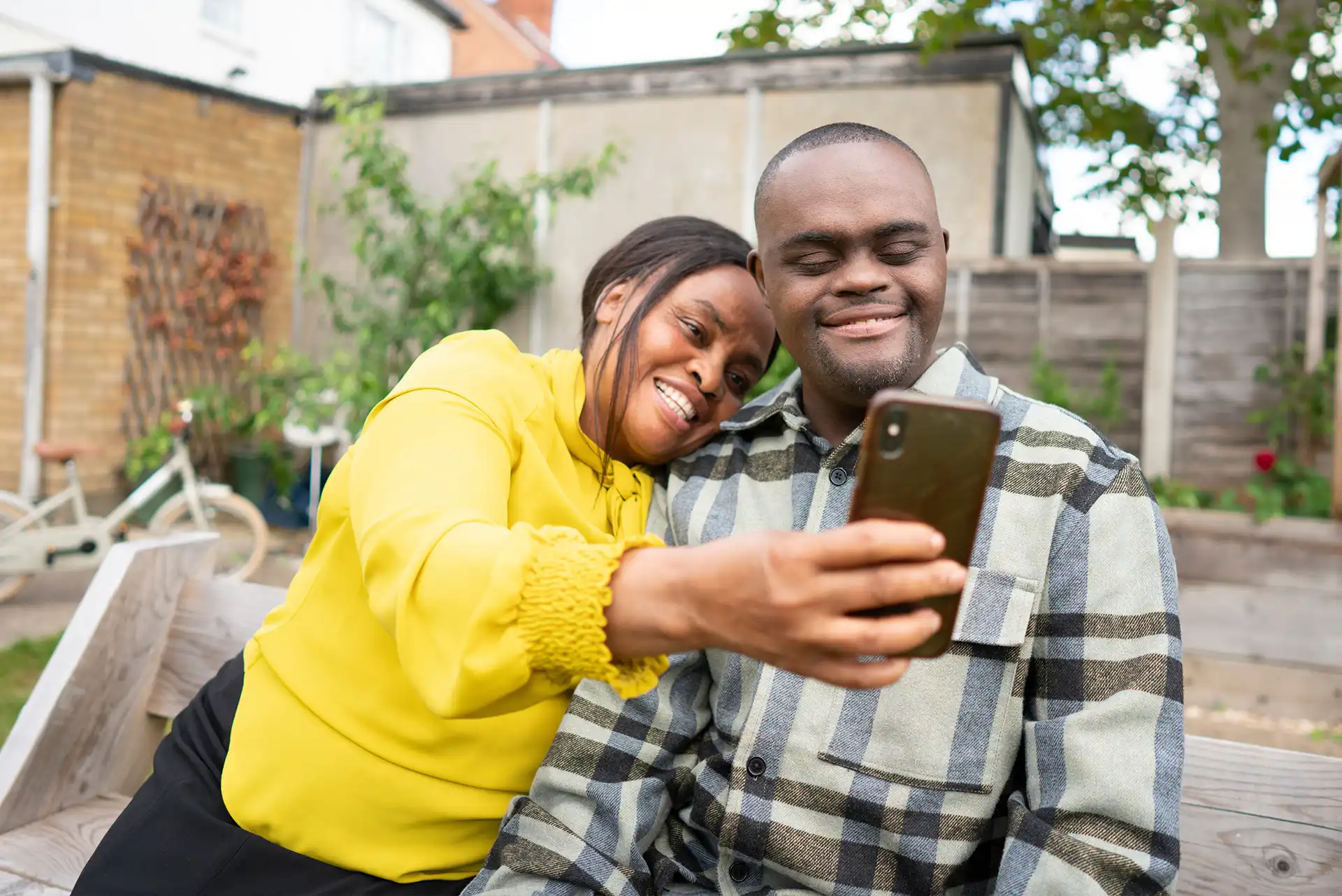 A mother with her son who has Down syndrome