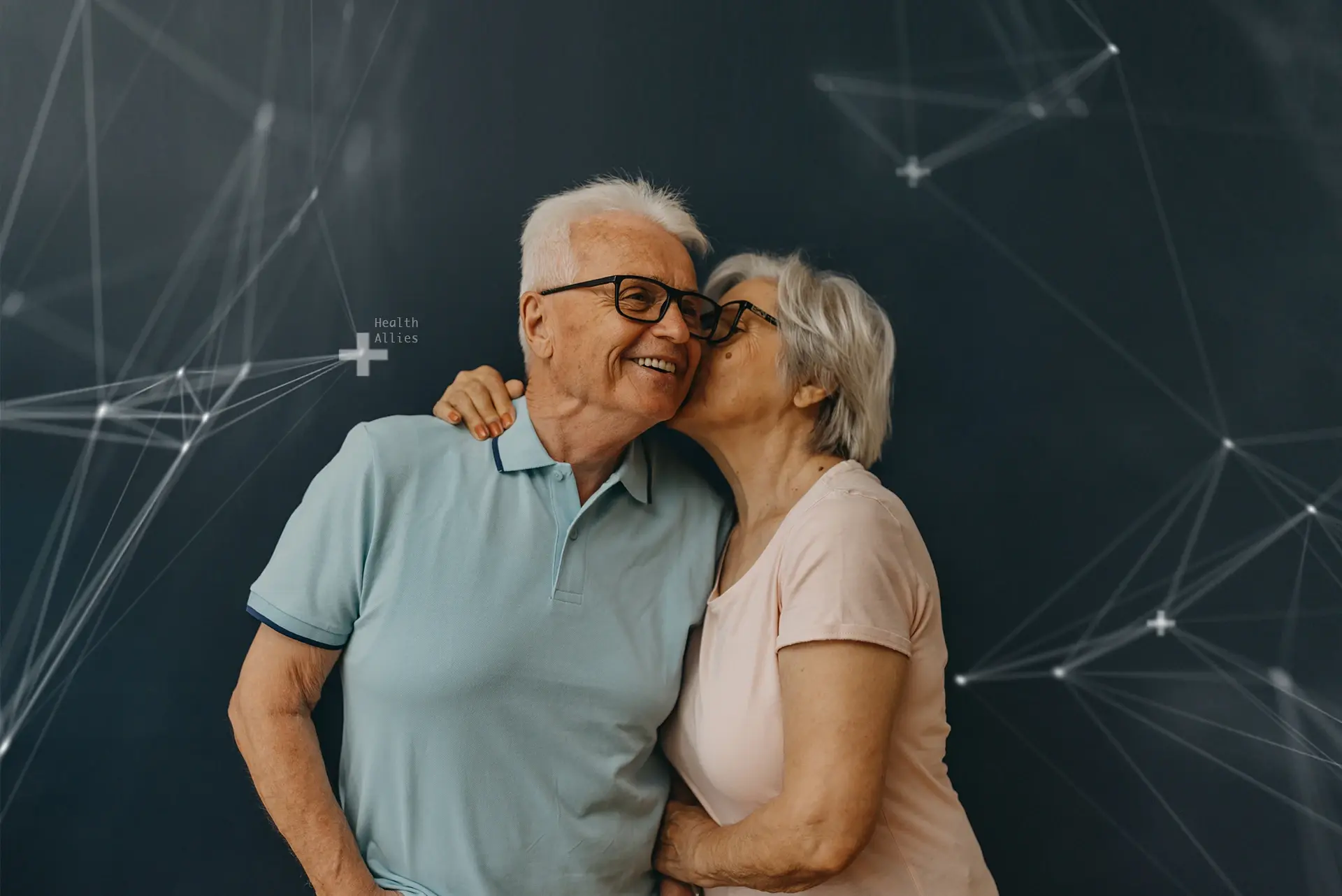 Husband and wife holding one another